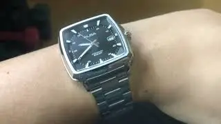 The Alba Mechanical Square Face Black Dial AU4043X on my wrist