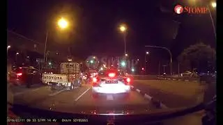 Motorcyclist sent flying after car beats red light and crashes into him at Bukit Batok