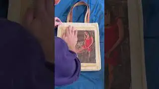 Transferring a magazine image to a blank tote bag with modge podge!