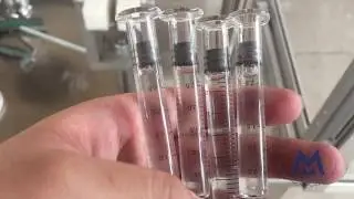 Small glass tube injector filling machine