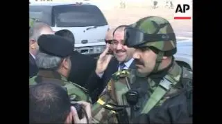 WRAP US aircraft circle as gunbattle rages on major street, Maliki on new security plan