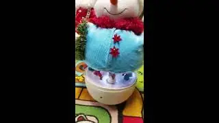 Animated Musical Lighted snowman with carousel