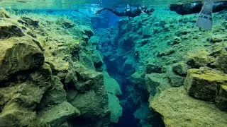 ICELAND GLACIAL SNORKELING BETWEEN TWO CONTINENTS IN CLEAREST WATER ON EARTH! SILFRA FISSURE (4K)