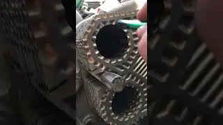 mechanic job.MTU mercedez marine engine.heat exchingger cooling system.replace new gasket rubber.