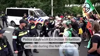 Police clash with activists during NATO summit | REUTERS