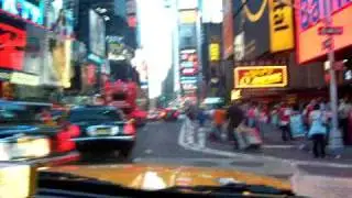 in a taxi on Times Square to Milford Plaza