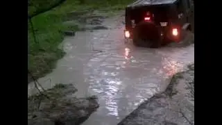 Goon Squad Sayre Jeep Wrangler Jk in a local mud hole