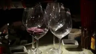 red wine is poured in the glasses close up