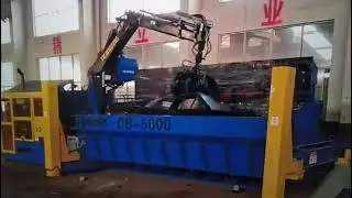 Hydraulic car body baling machine, professionally baling scrap car bodies.