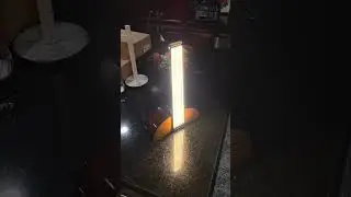 trash to art - a decorative light fixture made out of an old broken guitar
