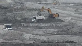 Out of the coal pit into the office. How China's fleet of autonomous mining trucks is transforming j