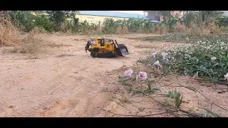 RC Off-Road Crawler Trekking Through Tall Grass