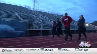 Runners meet at Greyhound Stadium to prep for upcoming Gulf Coast Marathon