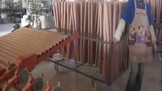 Automatic cutting and curling machine for paper tube production