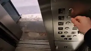 Heights hydraulic glass elevator at the Botanical Garden MTA MNRR station (Bronx, NY)