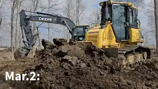 Clean out a Ditch with a John Deere 210G!