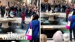 Climate activists pour black liquid into Rome fountain