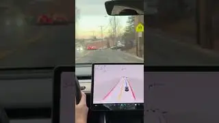 Tesla FSD Beta properly reacting to cars entering the road