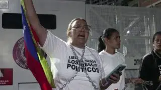 Political prisoners' relatives wait outside detention center as 'general amnesty' law announced| AFP