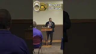 SGPD Captain Manny Arana of the South Gate Kiwanis giving his 