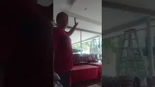 Cleaning the wall glass and changing curtains 