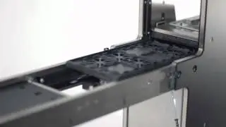 Random Access Matrix Tray Feeder by Quasys