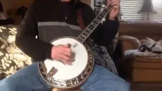 Dennis plays Do Lord on banjo