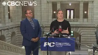 Progressive Conservative party leader Wayne Ewasko & MLA Kathleen Cook speak to reporters after QP