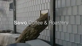 Sawo Coffee & Roastery | An Unique Coffee Shop Surrounded by Glass Bricks Partitions and Trees.