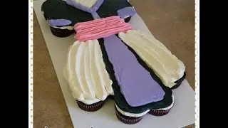 Hmong cake.  A Hmong dress pullapart cupcake cake.