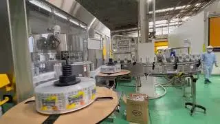 High-Speed Roll-fed Labeling Machine | 18000BPH | OPP hot melt labeler | Used in Japan