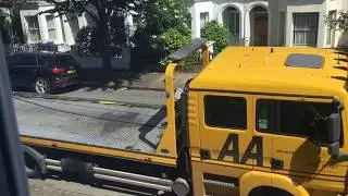 AA Breakdown recovery Truck Giving Roadside Assistance in London UK