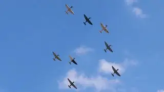 8 WWII fighters tailchasing over Duxford: Mustang, Hurricanes and Spitfires