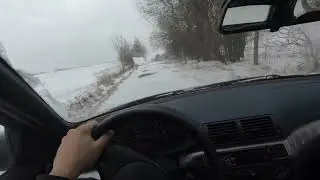 Plowing snow with my daily BMW. (and getting stuck)