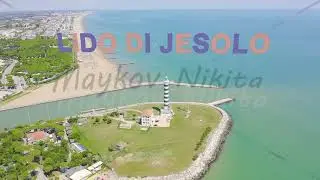 Inscription on video. Italy, Jesolo. Light House Faro di Piave Vecchia. Lido di Jesolo, is the beach