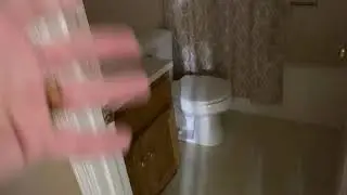 Inspecting a bathroom during a home inspection