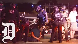 Dallas protests continue just outside curfew zone, ends with police confrontation on bridge