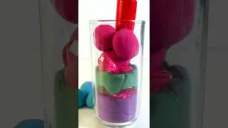 Kinetic sand in 4 colors and pink hearts pressed in a cup