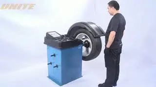 UNITE U-729 Wheel Balancer Operation - how to balance a tire with machine