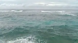 Ocean Waves Crashing in the Open Sea, White-Capped Ocean Waves Breaking