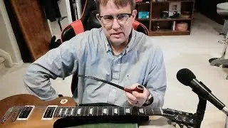 Changing guitar strings with some Bob's Chocolate Flake