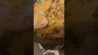 Chicken carrot potato wrap with a delicious mixed salad with walnuts and raisins