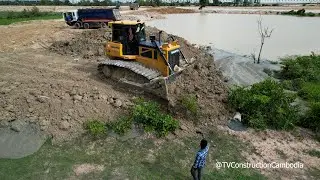 Fill The Soil, Clear The Water And Mud, Process Bulldozer Pushing Dirt And Dump Trucks Dumping Dirt