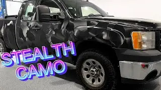 Wrapping a GMC Sierra in Vvivid Black Stealth Camo