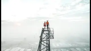 Couple climb the highest construction site in the world
