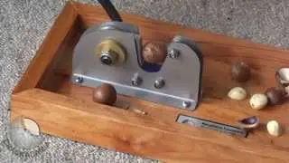CRACKADAMIA Macadamia nut Cracker in action - 'Deluxe Base Cracker'