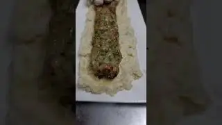 Anatochia kebab.  with deep of mash potato 🥔 and rosted eggplant 🍆  , tomato 🍅 chilli 🌶  garlic 😋 👌.