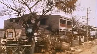 Aftermath of battle during Vietnam war. Wrecked buildings in Saigon, Vietnam. HD Stock Footage