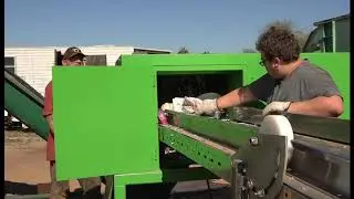 G.I.S. CONSULTING PRECISION SHEAR MACHINE IN USE. (LANDFILL DIVERSION TECHNOLOGY)
