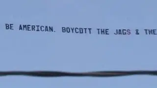 Small business owner flies protest banner over NFL game
